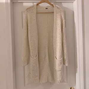 Free people long crochet cardigan with pockets.